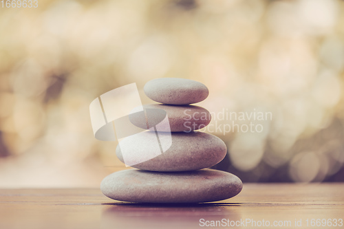 Image of balancing pile of pebble stones, like ZEN stone