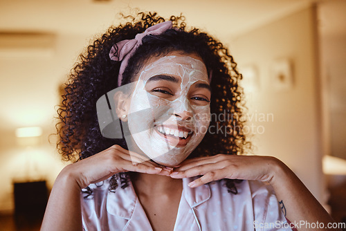 Image of Black woman, afro and skincare mask in portrait, home bathroom or dermatology spa in healthcare, wellness or face grooming. Happy smile, facial and cream product in beauty cleaning or acne treatment