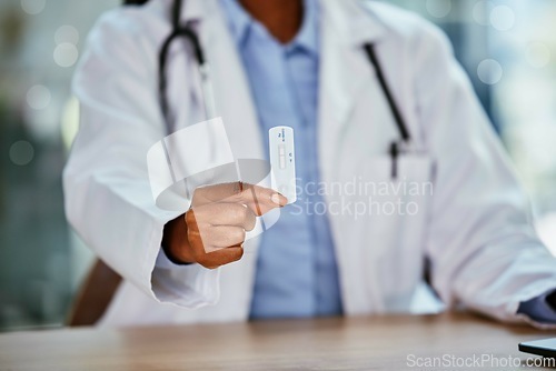 Image of Covid 19, antigen test and doctor hand for healthcare, compliance or insurance in hospital office bokeh. Pharmacy, clinic and professional black woman or medical expert product for corona virus exam