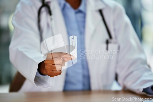 Image of Covid, antigen test and doctor hand for healthcare, compliance or insurance in hospital office bokeh. Pharmacy, clinic and professional black woman or medical expert product for corona virus exam