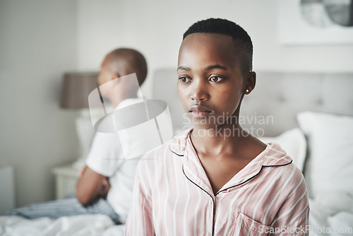 Image of Stress, depression and insomnia, black couple on bed in home angry after argument or fight. Mental health, relationship and divorce problem, woman and man frustrated and depressed in bedroom thinking