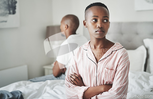 Image of Mental health, depression and marriage, black couple on bed in home angry after cheating argument or fight. Stress, relationship and divorce problem, woman and man frustrated and depressed in bedroom