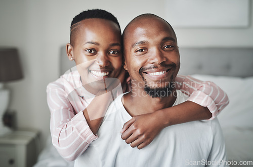 Image of Black couple, hug and smile in portrait with love and care at home, relax and commitment with healthy relationship. Happy people, partnership and trust with loyalty, support and affection and peace