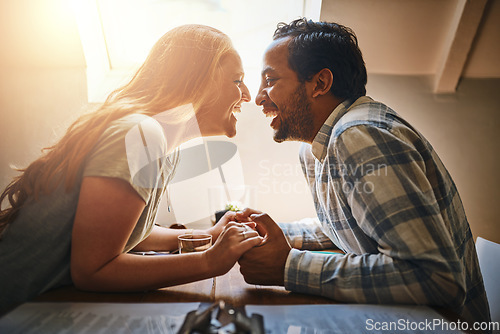 Image of Love, couple and holding hands on table at restaurant, laughing at funny joke and bonding. Valentines day, romance diversity and affection, passion or care of man and woman enjoying date time at cafe