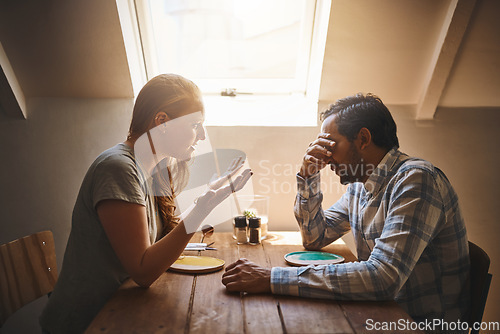 Image of Upset couple, argument and disagreement on date in discussion, fighting or breakup at restaurant. Woman talking to cheating man at dinner table in conflict, problem or affair in conversation at cafe