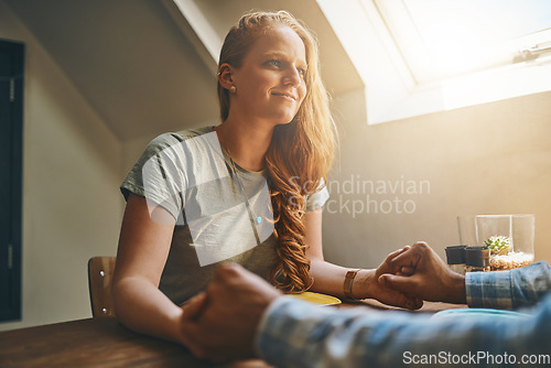 Image of Date, happy and woman at lunch or breakfast at a cafe or restaurant with her boyfriend enjoying quality time. Valentines day and people sitting at a table at a coffee shop holding hands and love