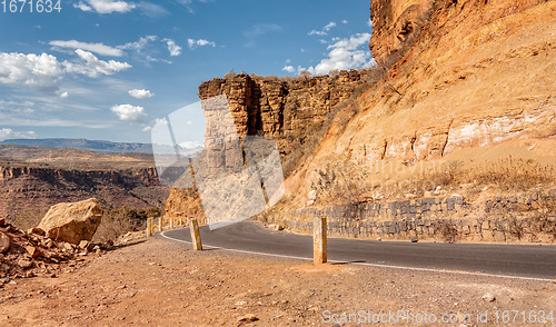 Image of asphalt road descending to the bridge over the blue nile,. Ethiopia, Africa