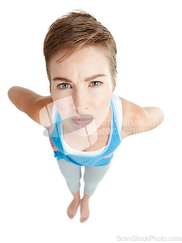 Image of Top view, angry and portrait of confused woman on white background with attitude, hands on hip and anger. Body language, mockup space and face of upset, annoyed and frustrated girl isolated in studio