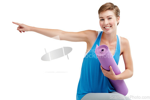 Image of Yoga, pointing and woman isolated on a white background with training gear for product placement on mockup. Happy fitness, exercise or workout person in pilates, sports portrait show space in studio