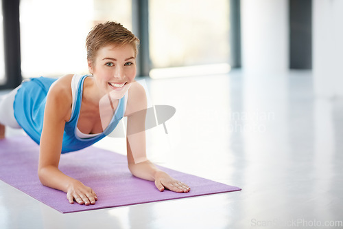 Image of Woman, fitness and plank on yoga mat for strong core, spiritual wellness or zen workout indoors on mockup. Portrait of happy female yogi with smile stretching for exercise, pilates or balance at gym