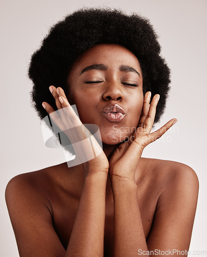 Image of black woman, kiss and model face with skincare, beauty and spa aesthetic in a studio. Isolated, white background and wellness treatment of a young person feeling calm from self care and dermatology