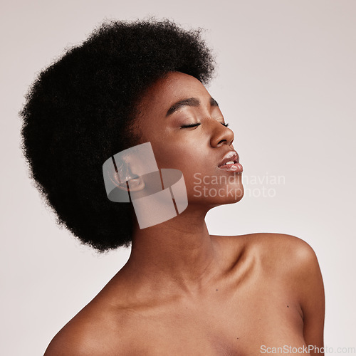 Image of Beauty, black woman and skincare spa aesthetic with skin glow and cosmetics in a studio. Dermatology, facial and self care of a young person model feeling calm from cosmetic and detox treatment