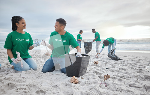 Image of Friends, help and recycling with people on beach for sustainability, environment and eco friendly. Climate change, earth day and nature with volunteer and plastic for cleaning, energy and pollution