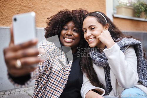 Image of Woman, friends and selfie smile in the city for friendship memory, social media or profile picture. Happy women smiling for photo, online post or vlog in travel, journey or trip in a urban town