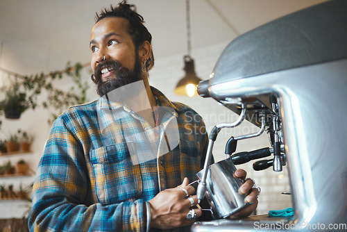 Image of Coffee shop, startup and service with a man barista behind the counter to prepare a drink. Cafe, kitchen and waiter with a male working in a restaurant as an entrepreneur or small business owner