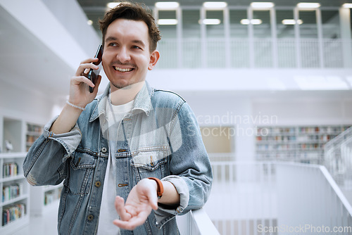 Image of Man, phone call and communication at library for conversation, discussion or advice. Happy male with smile talking on mobile smartphone in big book store or study for decision making, choice or idea