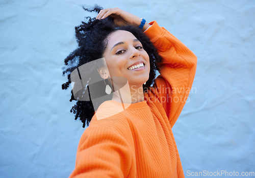 Image of Happy, fashion and portrait of black woman on blue background with smile, positive mindset and peace. Happiness, beauty and face of girl relax in city with urban style, trendy and stylish clothes