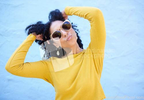 Image of Fashion, sunglasses and black woman with kiss face, summer style and beauty with hairstyle on blue background. Fun, pose and African American model, trendy and stylish with designer brand mockup