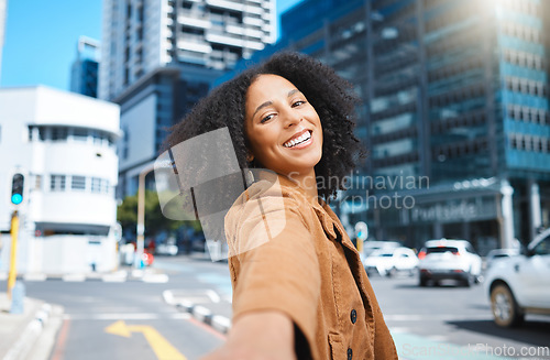 Image of Selfie, urban city and black woman for travel, fashion influencer and social media update of journey in street. Walking, carbon capture and happy person in road with portrait or profile picture