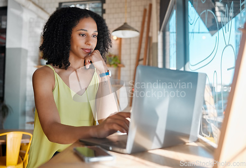 Image of Coffee shop, laptop and black woman with cafe wifi connection while reading email or feedback. Young entrepreneur person doing remote work, social media or writing blog post content on internet