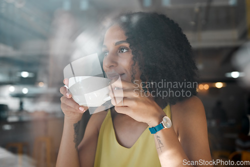 Image of Morning coffee, thinking black woman and coffee shop window with a person in a restaurant. Cafe, sitting and African female with a hot drink of tea enjoying the day with happiness and an idea