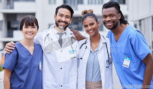 Image of Healthcare, doctors and portrait of a hug for medicine, city nursing and outdoor medical team. Happy, support and teamwork for health collaboration, solidarity and working together in Portugal