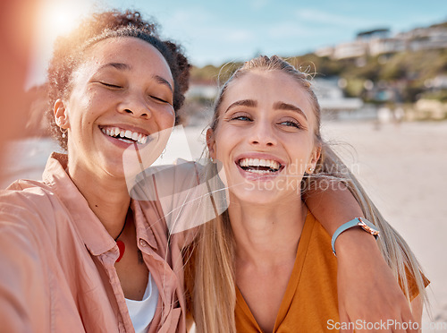 Image of Selfie, funny and laughing friends at the beach for bonding, weekend and holiday in Miami. Happy, comic and women with a photo for vacation memory, travel and happiness hug by the sea in summer