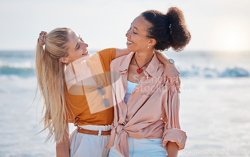 Image of Hug, friendship and women at the beach for bonding, weekend fun and quality time in Miami. Travel, summer and friends with affection, freedom and on holiday together at the sea to relax by the ocean