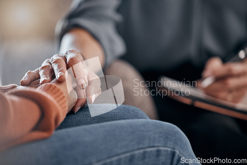 Image of Closeup, hands and support in therapy, conversation and grief with compassion, empathy or support. Zoom, hand or female with sadness, therapist or communication for solutions, mental health or stress