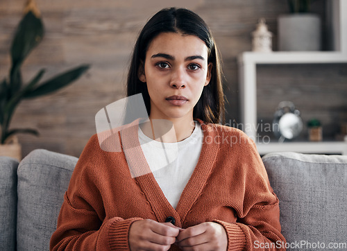 Image of Portrait, mental health and therapy with a black woman patient in an office, sitting in an office to talk about depression.