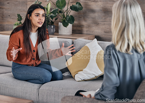 Image of Counseling, psychology woman listening to client in therapy for mental health problem, mind healthcare or advice. Anxiety and stress patient consulting professional therapist or psychologist on sofa