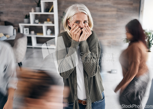 Image of Anxiety, schizophrenia and woman in mental health problem, crisis and fear in busy office or workplace. Scared, depression and trauma of bipolar senior person with fast people, speed or walking crowd