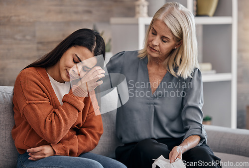 Image of Sad woman, therapist and care for understanding in support for addiction, mental health or counseling. Female counselor or shrink helping crying patient in healthcare, therapy session or meeting