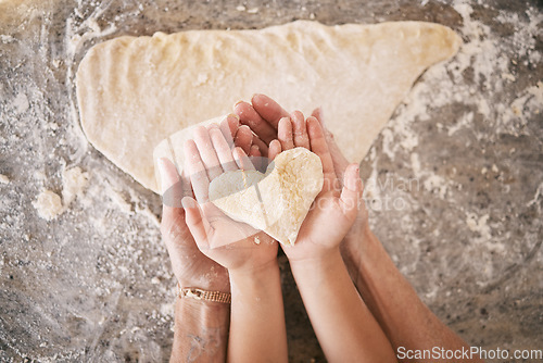 Image of Top view, hands and heart with parent baking with kid, teaching and bonding together, weekend break and loving. Love, family or in kitchen with dough, love or child development with skills or support