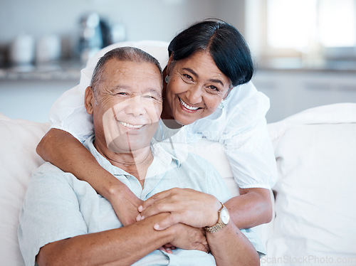Image of Hug, love and senior couple portrait for happiness, gratitude and care on the living room sofa. Affection, happy and elderly man and woman on couch to relax during retirement freedom in the lounge