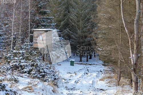 Image of Winter hunting tower covered with snow