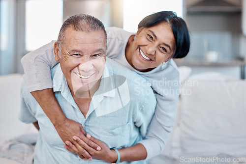 Image of Love, retirement and portrait with an old couple in the living room of their home together to relax. Sofa, bonding or marriage with a senior man and woman relaxing in the lounge of their house