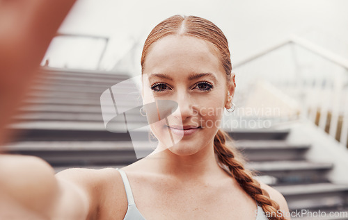 Image of Selfie, fitness and woman portrait by outdoor stairs ready for running, exercise and workout. Happy, influencer and smile of a young person runner on the internet or web with sport wellness