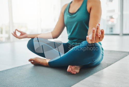 Image of Closeup, hands and woman with yoga, meditation and relax for balance, calm and zen practice on floor. Zoom, female yogi or lady with pilates training, peace and wellness for healthy lifestyle or rest