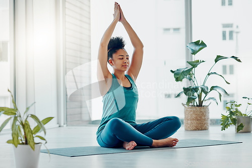 Image of Yoga, meditation exercise and black woman prayer hands for fitness, peace and wellness. Young person in health studio for holistic workout, mental health and body balance with zen mind and energy