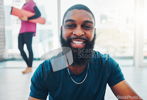 Image of Smile, fitness and portrait of a black man at the gym for training, exercise and a cardio workout for health. Happy, motivation and African athlete with happiness after a club sport for a strong body