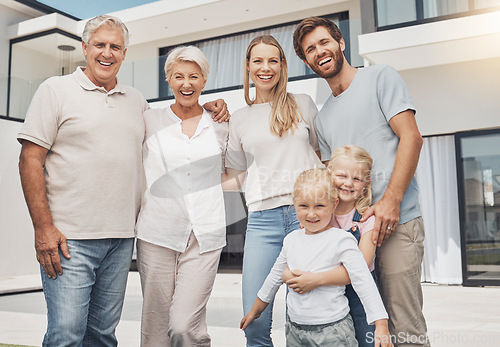 Image of Big family, senior people and child backyard at luxury house, property or real estate in happy group portrait. Love, home and elderly parents, mother and father with kids for investment or retirement