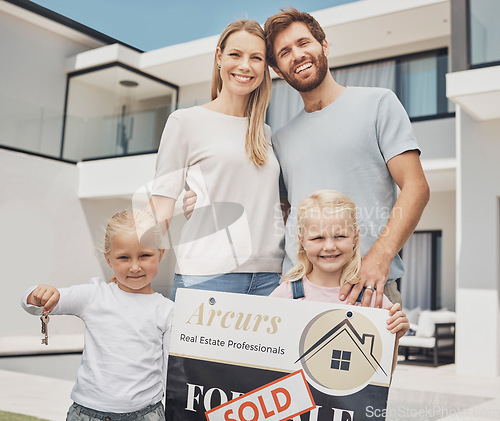 Image of Real estate, house and portrait of family with keys and a sign for moving, property and homeowner. Happy, showing and parents with children, board and relocation after buying a new home from realtor