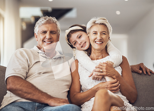Image of Love, portrait or grandparents hug a girl in living room bonding as a happy family in Australia with care. Retirement, smile or elderly man relaxing old woman with child at home together on holiday