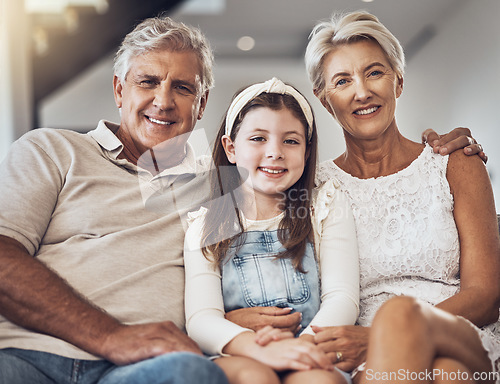 Image of Smile, portrait or grandparents hug a girl in living room bonding as a family in Australia with love. Retirement, happy or elderly man relaxing old woman with child at home together on fun holiday