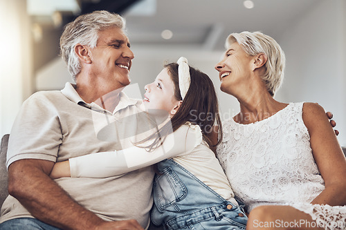 Image of Relax, love or grandparents hug a girl in living room bonding as a happy family in Australia with care. Retirement, smile or elderly man relaxing old woman with child at home together on fun holiday