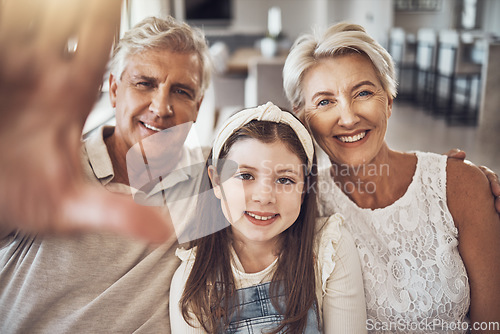 Image of Selfie, portrait or happy grandparents with girl in living room bonding as a family in Australia with love. Pictures, smile or elderly man relaxing old woman with child at home together on holiday