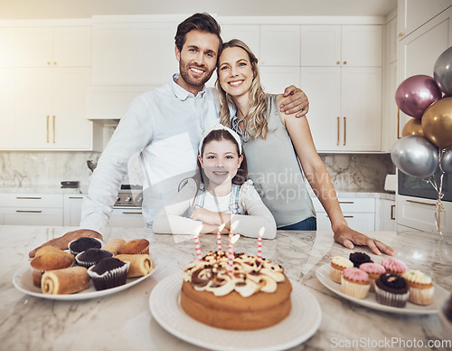 Image of Birthday party, cake and family portrait in kitchen for celebration event in house. Love, food and kid, girl or child with happy father and mother celebrating special day, care and bonding in home.