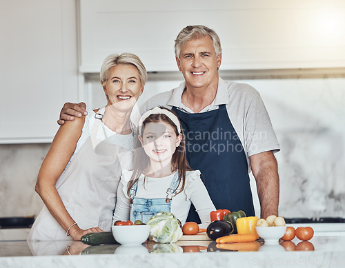 Image of Portrait, grandparents or child cooking as as happy family in a house kitchen with organic vegetables for dinner. Grandmother, old man and young girl bonding or helping with healthy vegan food diet