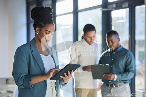 Image of Tablet, research and business woman in the office planning a corporate project with the internet. Technology, career and professional African female employee with a mobile device in the workplace.